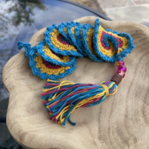 Peacock/gold/raspberry wind spinner