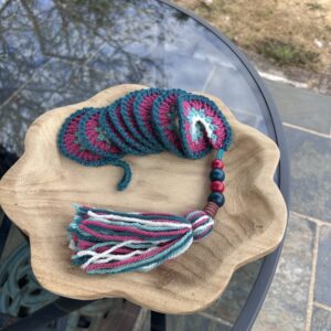 Teal/raspberry/white wind spinner